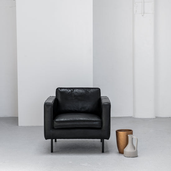 industrial black leather armchair at EDITO Furniture